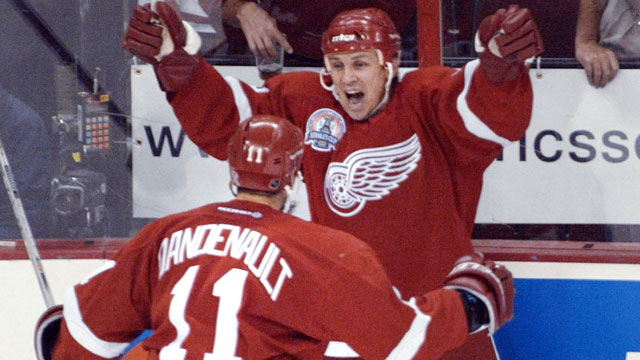 Igor Larionov dramatically gave his Detroit Red Wings a lead in the 2002 Stanley Cup final against the Carolina Hurricanes when he ended Game 3 at 14:47 of the 3rd overtime. (CP/Ryan Remiorz)