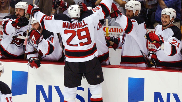 Grant Marshall clinched his New Jersey Devils’ second-round series when he scored in Game 5 against the Tampa Bay Lightning in 2003 at 11:12 of the 3rd overtime. (AP/Charles Krupa)