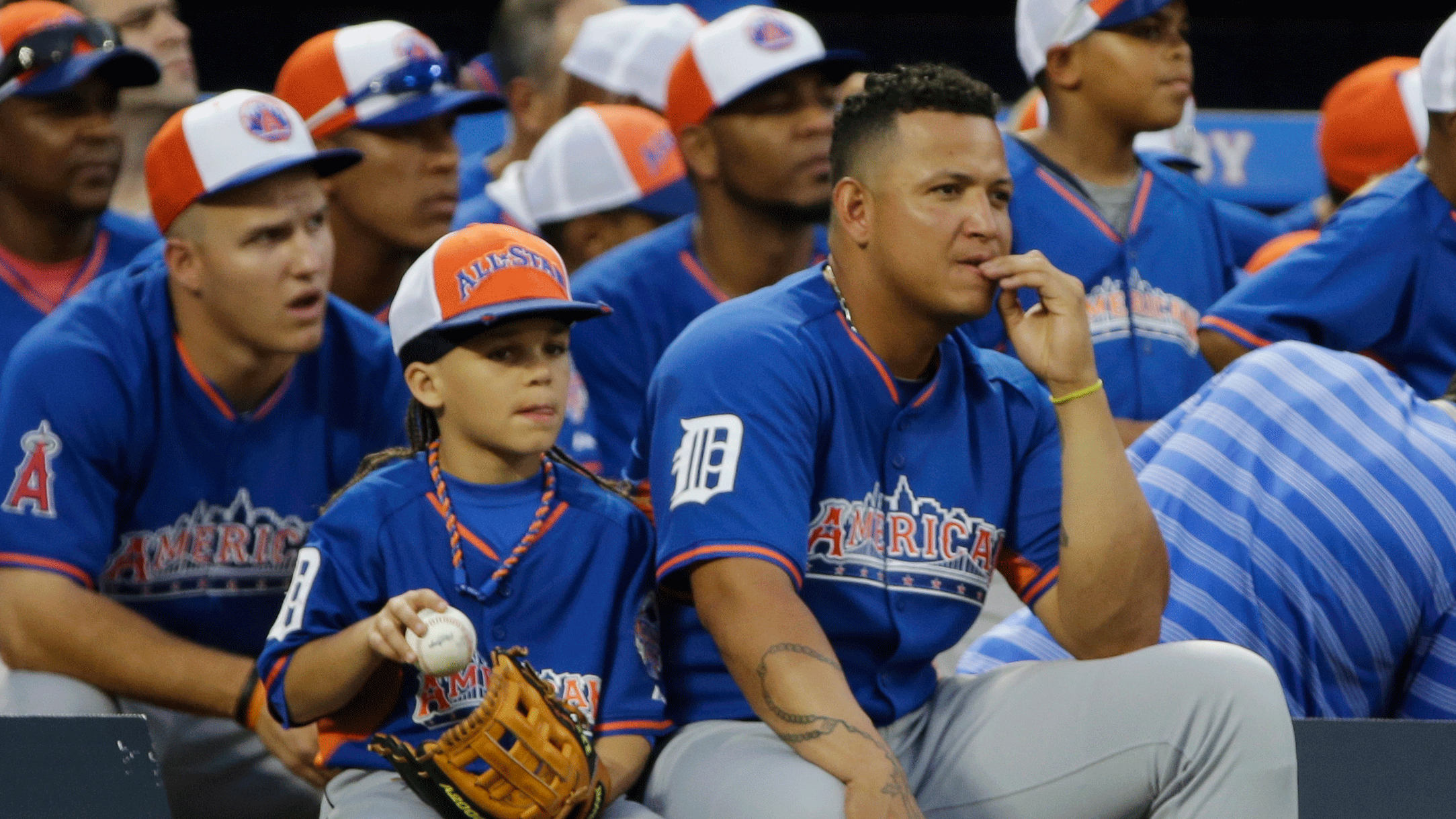 Members of the American League All-Star team and children look on. (AP/Matt Slocum)