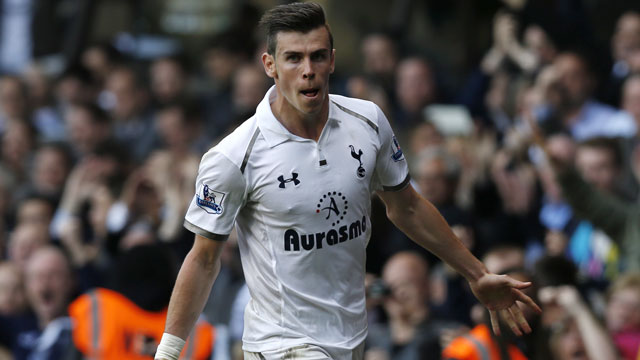 The biggest question surrounding Tottenham Hotspurs’ superstar Gareth Bale this off-season was not how good he is, but rather how much that remarkable, world class talent is worth. Since Real Madrid began expressing serious interest in the Welsh international midfielder this past May, numbers between £85 million and £105 million have been thrown around concerning his transfer fee, with the most recent news being disagreement on which end of that gaudy spectrum he belongs. Nevertheless, the north London club has maintained his services for the time being and there is little doubt that in terms of speed, intensity, strength and power in a winger, it is near impossible to find someone better in the Premier League (and maybe even the world). At only 24 years of age, the scary part about him is that he can still get better, and while it seems likely that one of the world’s giants will pick him up eventually, he will certainly fetch a steep price for his services. (AP/Sang Tan)