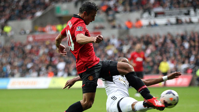 Robin van Persie scored two goals as Manchester United had no trouble cruising past Swansea (AP/Nick Potts)