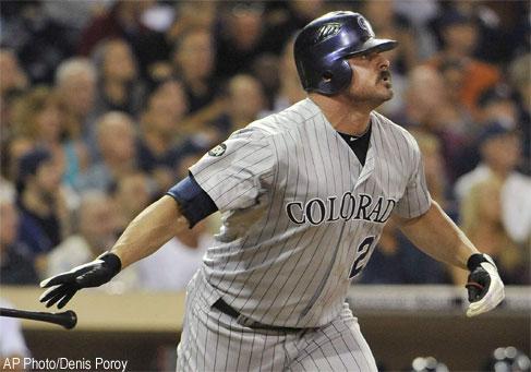 Rockies sign Giambi, Lindstrom to contracts