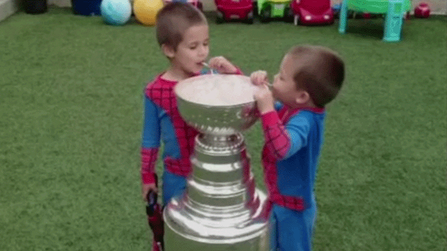 Kids blow milk bubbles in Stanley Cup