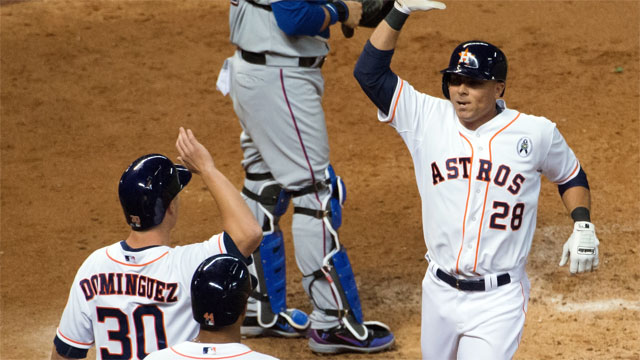 Astros beat Rangers to start 2013 MLB season