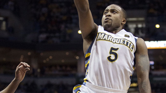 Marquette guard Junior Cadougan from Toronto. (AP/Tom Lynn)