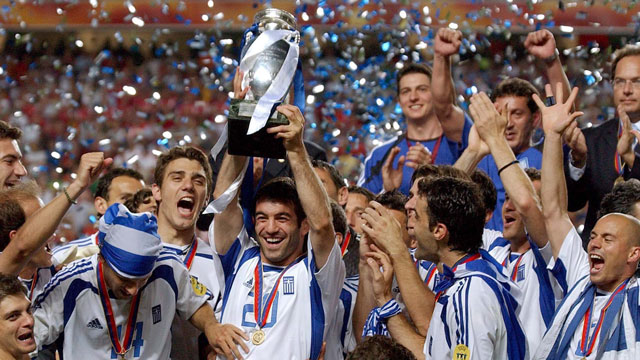 Manager Otto Rehagel and Greece shock the world by downing Portugal in Portugal at Euro 2004. (AP/Armando Franca)