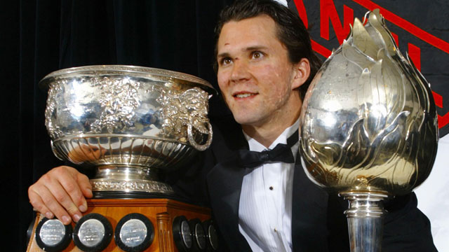 Art Ross and Hart Trophy winner Martin St. Louis leads the Tampa Bay Lightning to the Stanley Cup, defeating the Calgary Flames in the final. (CP/Adrian Wyld)