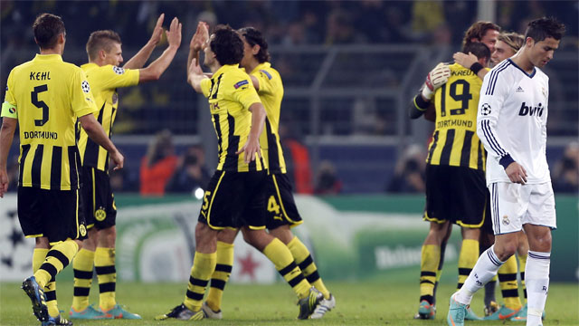 Borussia Dortmund made it through the group stage undefeated, finishing at the top of Group D with a record of 4-2-0. Placed in the 'Group of Death' with three other league winners, Dortmund's biggest group stage win was a 2-1 victory over Real Madrid in October. (AP/Frank Augstein) 