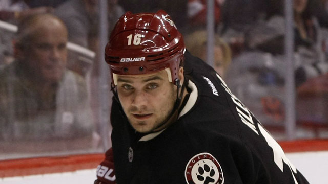 Phoenix Coyotes defenceman Rostislav Klesla throws Nashville Predators forward Matt Halischuk into the boards from behind in Game 4 of their second-round series.  Klesla gets one game for the hit. (AP/Rick Scuteri)