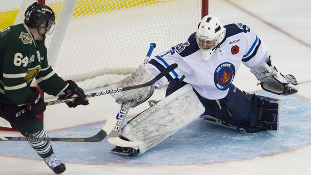 Saskatoon Blades' goaltender Andrey Makarov has been fantastic thus far, including this toe save on London's Ryan Rupert. (CP/Liam Richards)