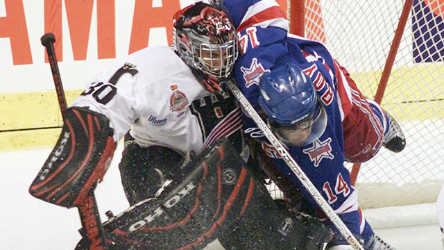 The Quebec Remparts battled but didn't have enough to compete as hosts in 2003, giving way to the juggernaut Kitchener Rangers. (CP/Jacques Boissinot)