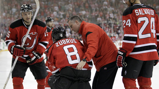 Philadelphia Flyer Claude Giroux elbows New Jersey Devil Dainius Zubrus in the head in Game 4 of the Eastern Conference final. Giroux got one game.  (AP/Julio Cortez)