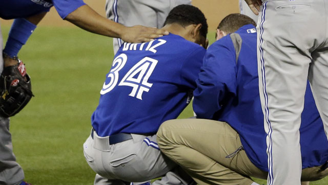 Ramon Ortiz was emotion after being forced to leave his June 2 start with an elbow strain, forcing him on the 15-day DL the day after. (AP/Gregory Bull)