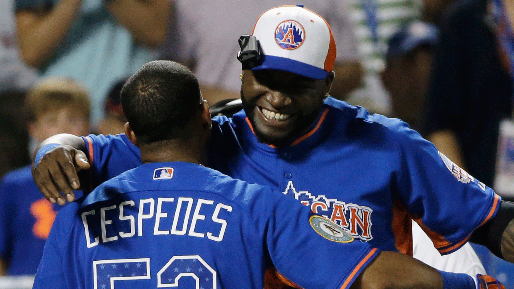 Yoenis Cespedes celebrates with AL teammate David Ortiz. (AP/Matt Slocum)