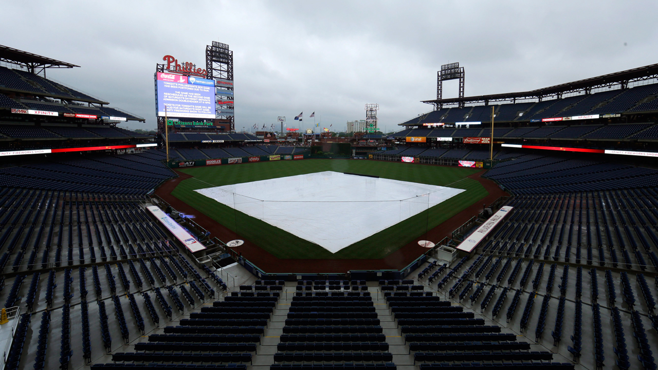 Tarp covers the infield at Citizens Bank Park in Philadelphia. (Matt Slocum/AP)