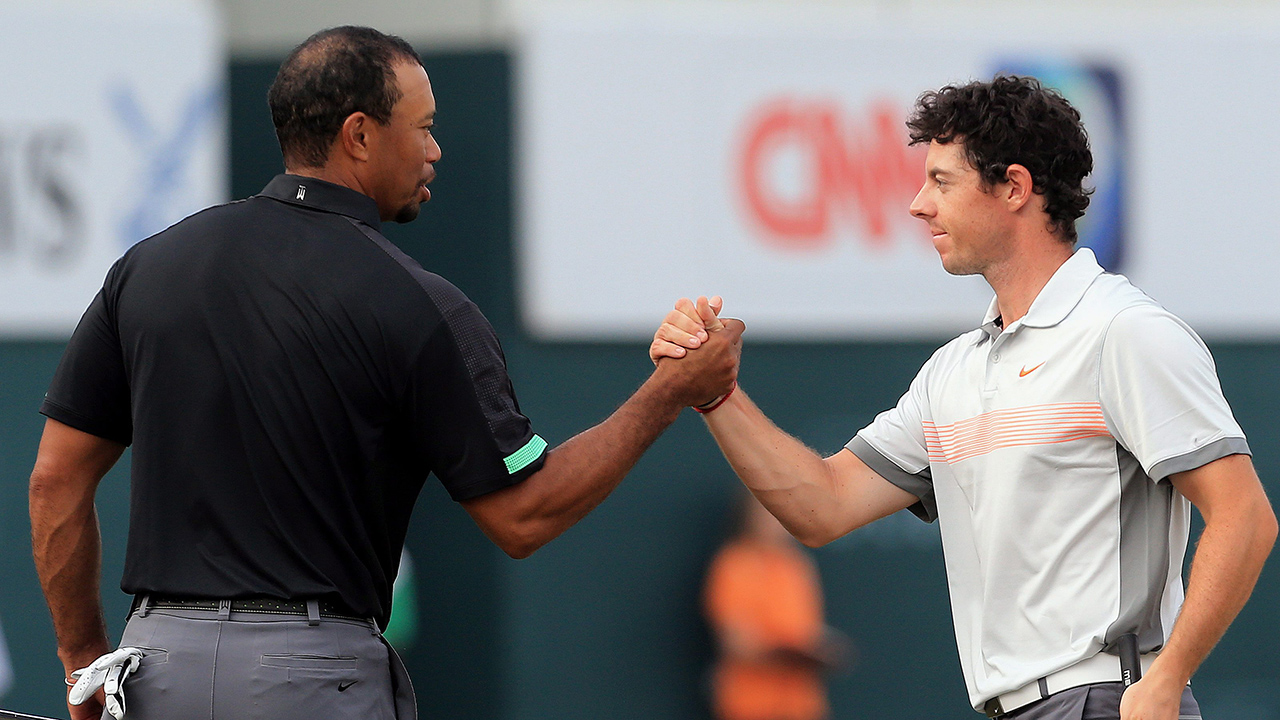 Tiger Woods and Rory McIlroy (AP)