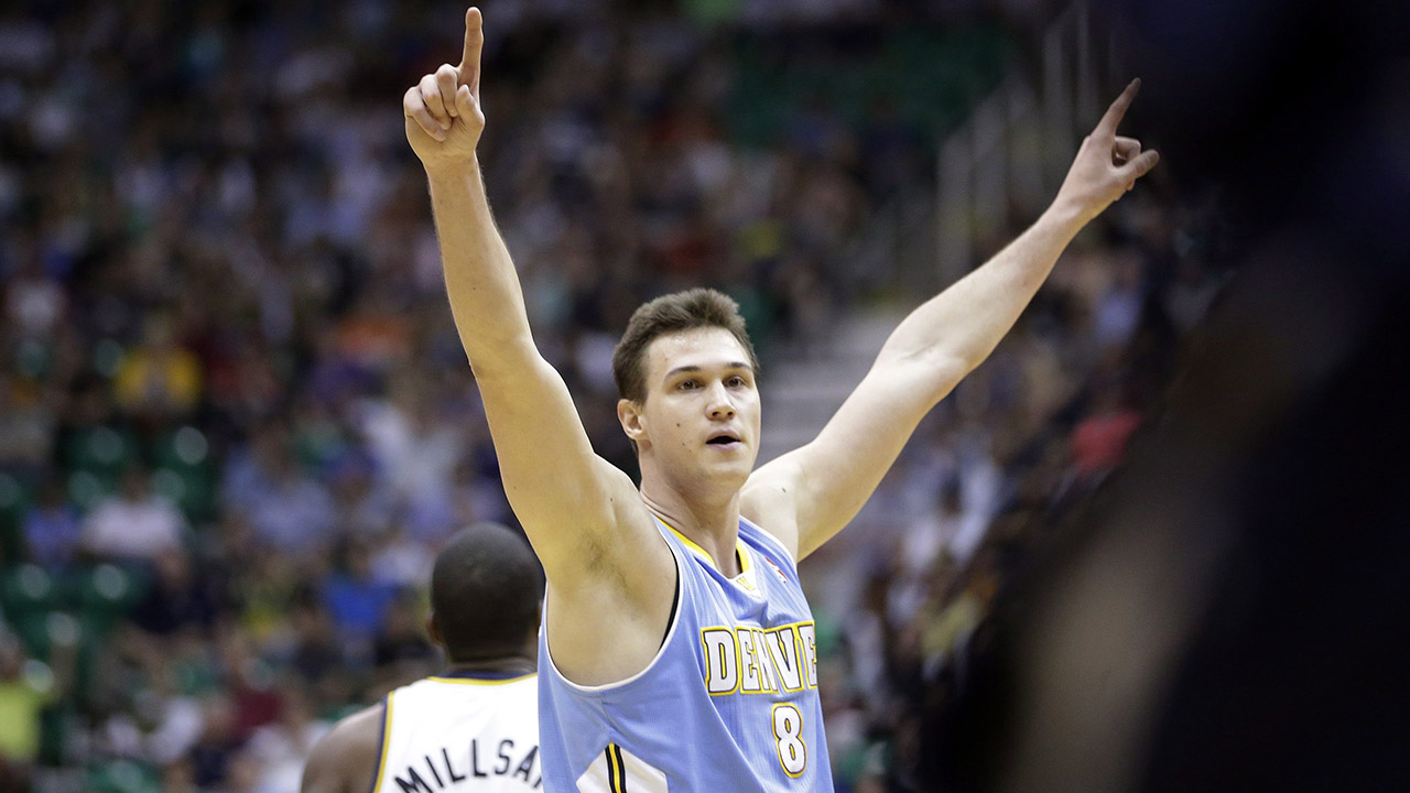 Denver Nuggets' Danilo Gallinari (8) celebrates in the fourth quarter during an NBA basketball game against the Utah Jazz, Wednesday, April 3, 2013, in Salt Lake City. The Nuggets defeated the Jazz 113-96. (AP/Rick Bowmer)