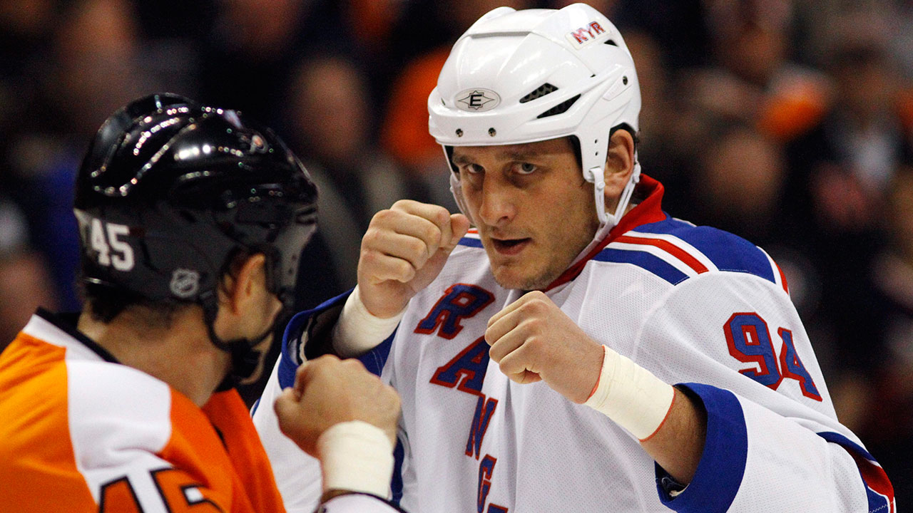 In-this-Nov.-4,-2010,-file-photo,-Philadelphia-Flyers'-Jody-Shelley,-left,-and-New-York-Rangers'-Derek-Boogaard-fight-during-an-NHL-hockey-game-in-Philadelphia.-The-father-of-a-New-York-Rangers-player-who-died-in-2011-of-an-accidental-overdose-says-his-son-was-no-friend-of-the-ex-minor-league-player-who-sold-him-Percocet.-(Matt-Slocum/AP)