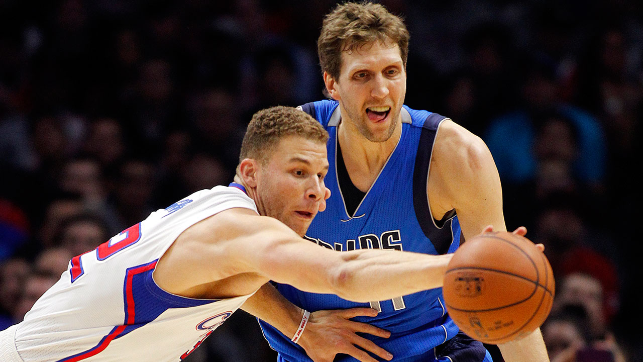 Clippers forward Blake Griffin, left, intercepts a pass intended for Dallas Mavericks forward Dirk Nowitzki. (Alex Gallardo/AP)