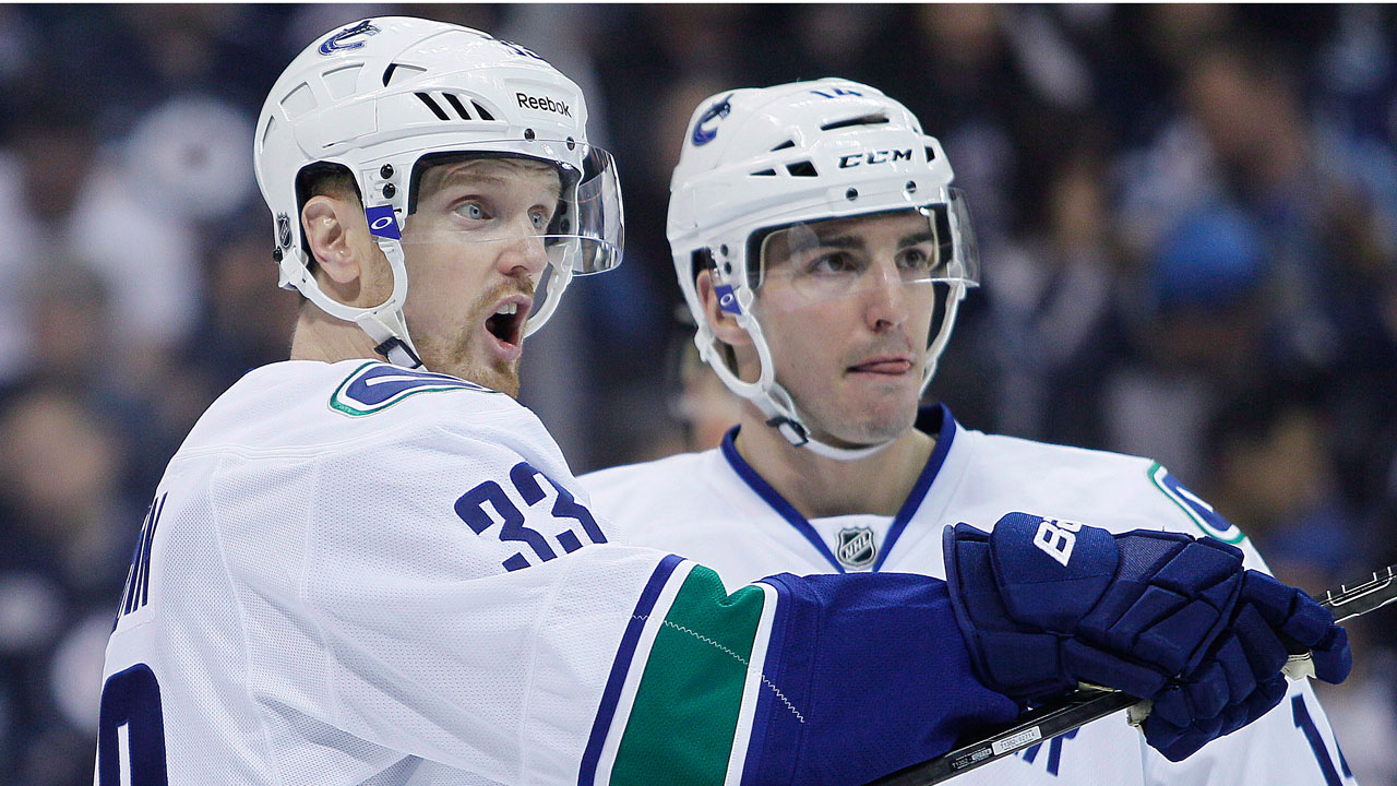 Henrik-Sedin;-Alex-Burrows;-Vancouver-Canucks
