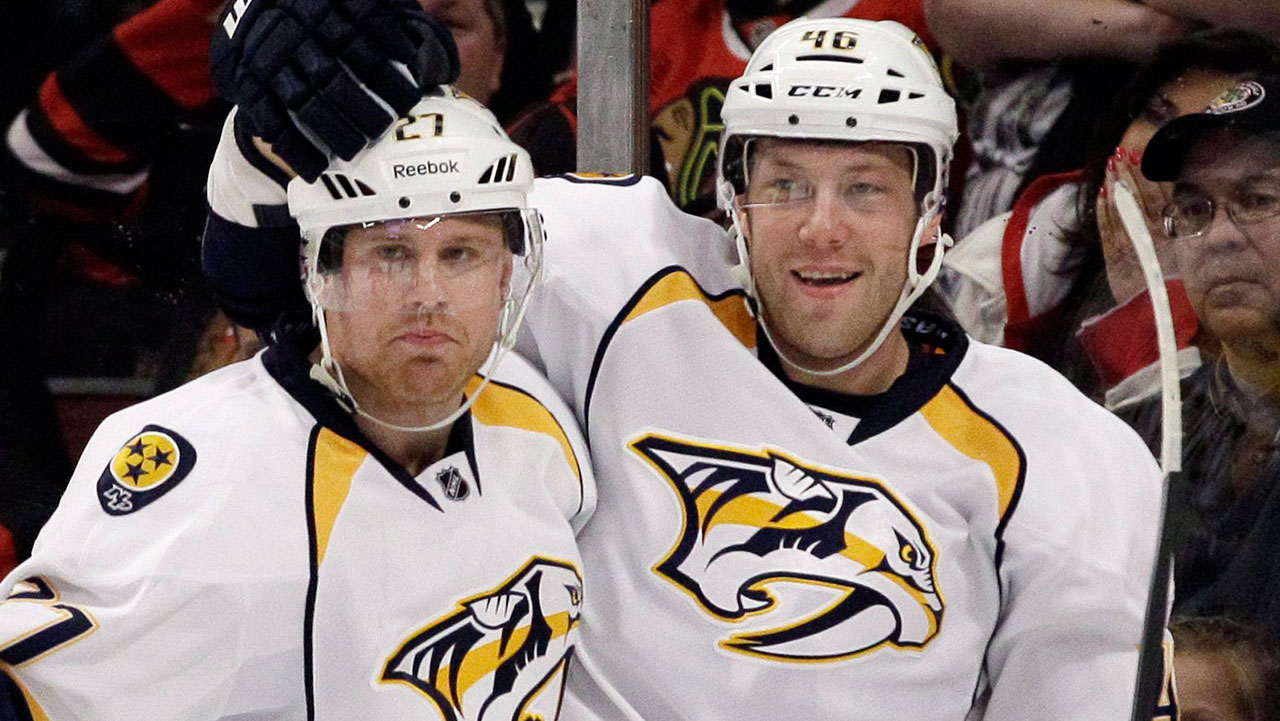 Nashville-Predators'-Andrei-Kostitsyn-(46)-celebrates-with-Patric-Hornqvist-(27)-after-scoring-his-goal-during-the-first-period-of-an-NHL-hockey-game-against-the-Chicago-Blackhawks-in-Chicago,-Sunday,-March-25,-2012.-(Nam-Y.-Huh/AP)