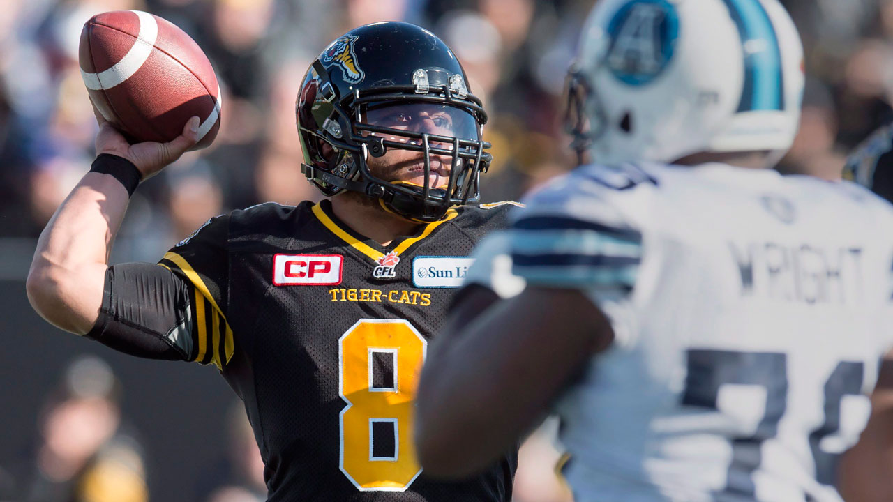 A-roughing-the-passer-call-on-Argos-defender-Martin-Wright,-right,-put-the-Tiger-Cats-in-position-for-the-game-winning-field-goal-in-the-East-Division-final.-(Frank-Gunn/CP)