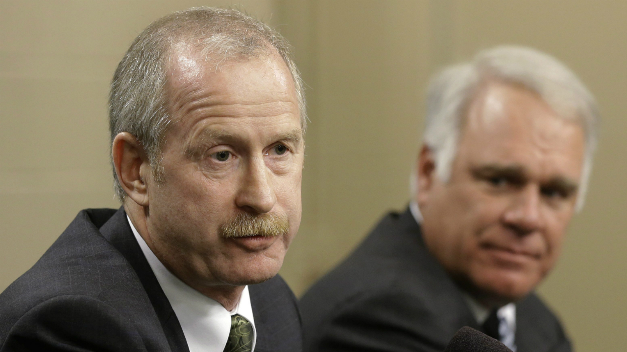 Dallas-Stars-newly-hired-general-manager-Jim-Nill,-left,-responds-to-a-reporter's-question-during-a-news-conference-as-president-and-CEO-Jim-Lites,-right,-watches-Monday,-April-29,-2013,-in-Dallas.-AP-Photo/Tony-Gutierrez)