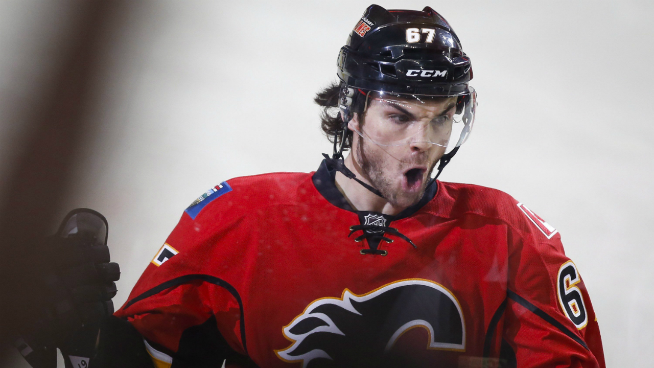 Calgary-Flames'-Michael-Frolik,-from-the-Czech-Republic,-celebrates-his-goal-during-first-period-NHL-hockey-action-against-the-St.-Louis-Blues-in-Calgary,-Monday,-March-14,-2016.THE-CANADIAN-PRESS/Jeff-McIntosh