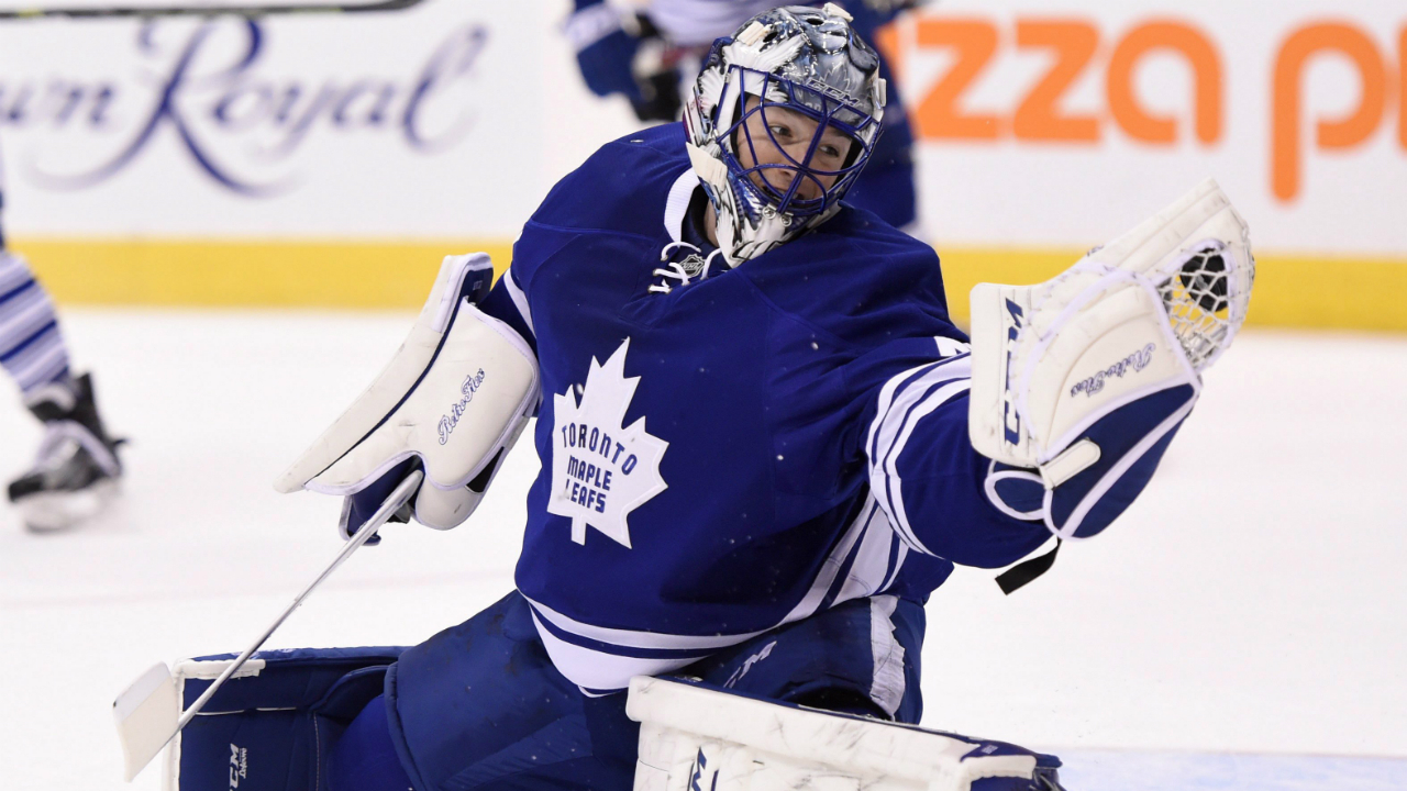 Toronto-Maple-Leafs-goalie-Jonathan-Bernier-makes-a-glove-save-against-the-Boston-Bruins-during-third-period-NHL-action-in-Toronto-on-Saturday,-March-26,-2016.-THE-CANADIAN-PRESS/Frank-Gunn