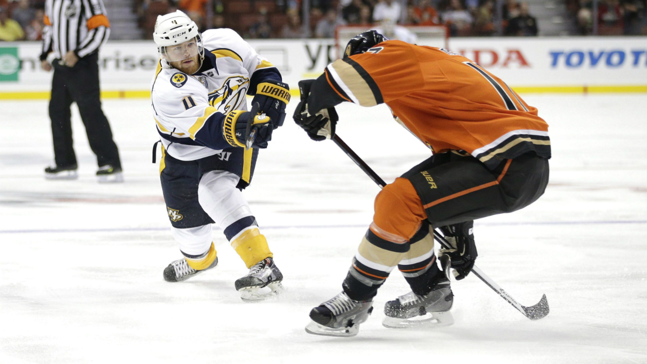 Nashville-Predators'-Ryan-Ellis,-left,-shoots-under-pressure-by-Anaheim-Ducks'-Ryan-Kesler-during-the-first-period-of-an-NHL-hockey-game,-Sunday,-Nov.-1,-2015,-in-Anaheim,-Calif.-(AP-Photo/Jae-C.-Hong)