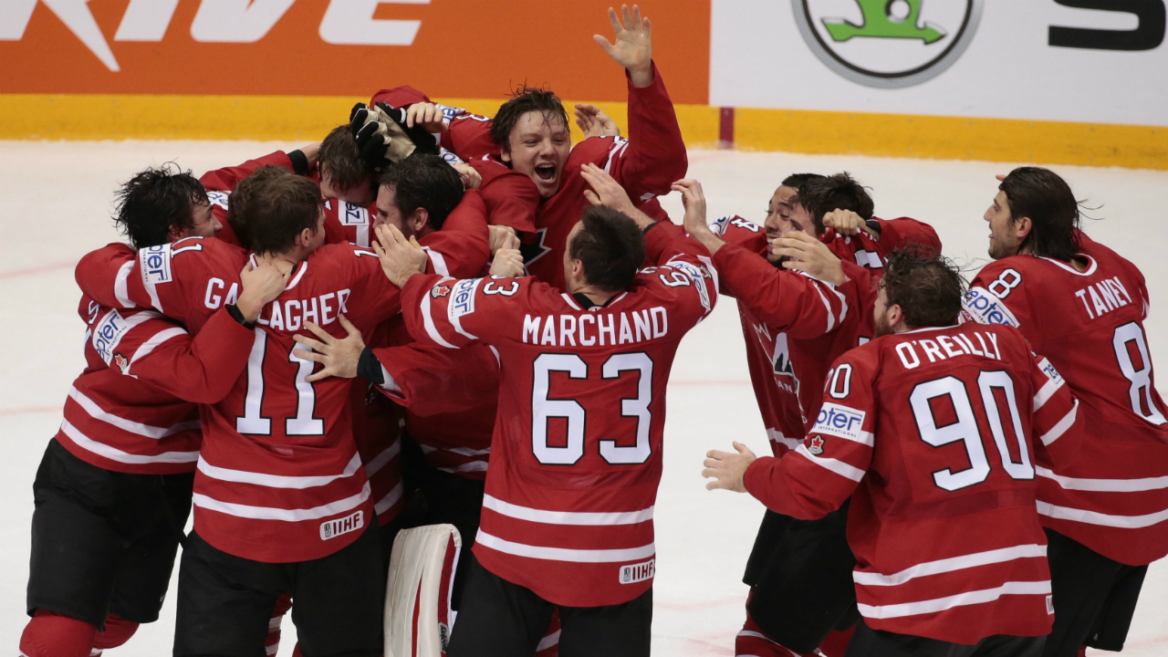 Canada's-players-celebrate-the-victory-goal-during-the-Ice-Hockey-World-Championships-final-match-between-Finland-and-Canada,-in-Moscow,-Russia,-on-Sunday,-May-22,-2016.-(AP-Photo/Ivan-Sekretarev)