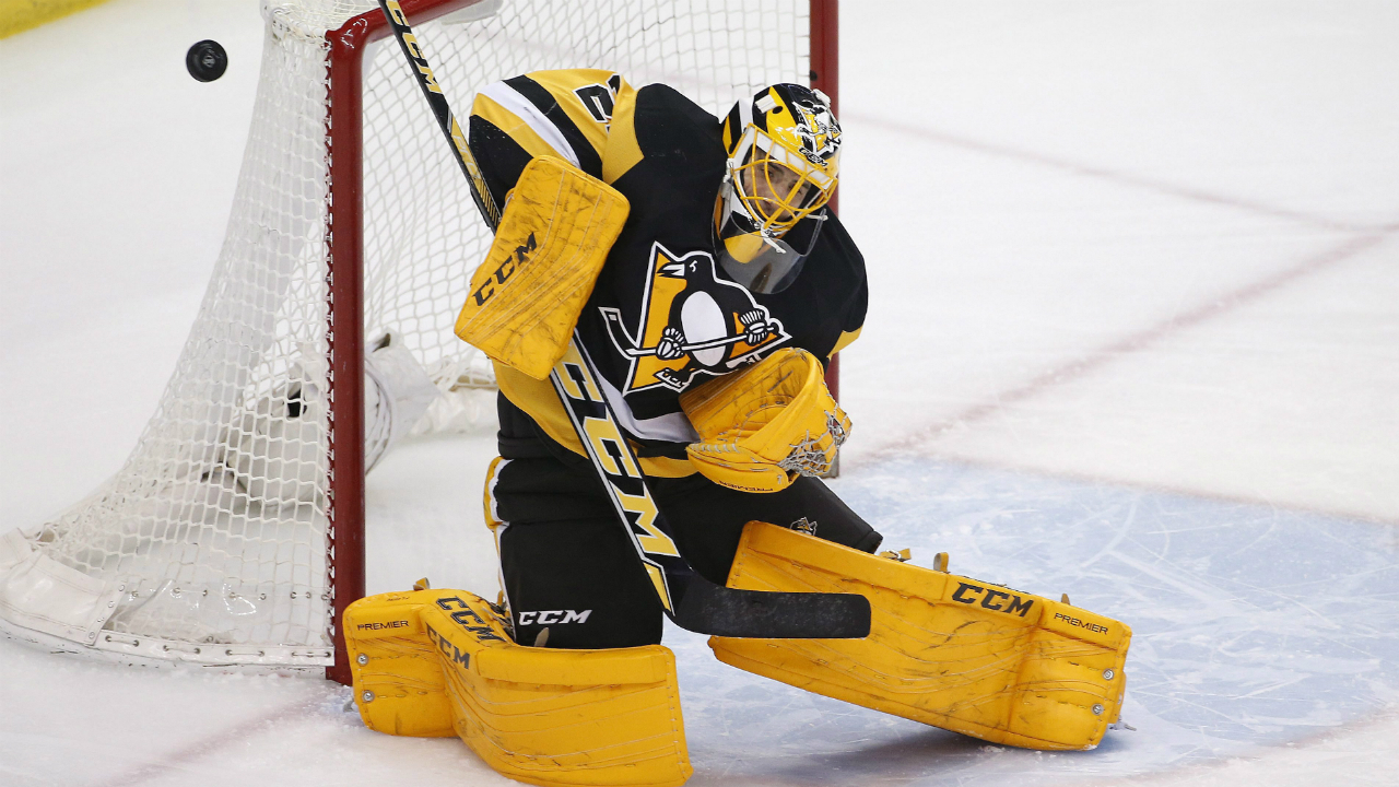Pittsburgh-Penguins-goalie-Marc-Andre-Fleury-(29)-blocks-a-shot-during-the-first-period-of-an-NHL-hockey-game-against-the-New-York-Rangers-in-Pittsburgh,-Thursday,-March-3,-2016.-(AP-Photo/Gene-J.-Puskar)