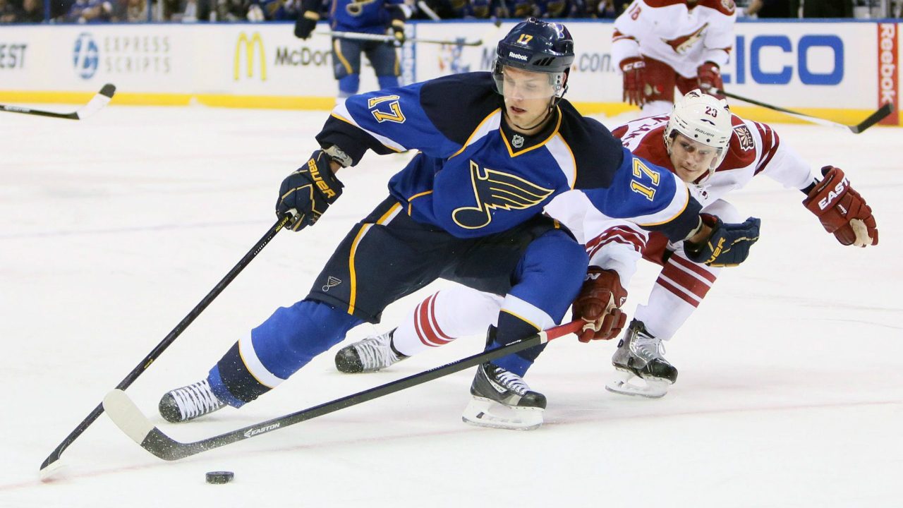 St.-Louis-Blues-left-wing-Vladimir-Sobotka,-left,-tries-to-keep-possession-of-the-puck-against-Phoenix-Coyotes-defenseman-Oliver-Ekman-Larsson-in-the-first-period-of-an-NHL-hockey-game-Tuesday,-Nov.-12,-2013,-in-St.-Louis.-(AP-Photo/St.-Louis-Post-Dispatch,-Chris-Lee)