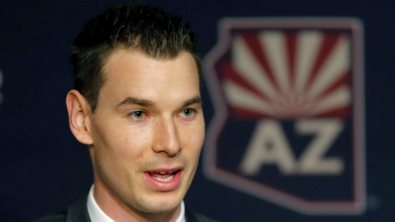 Newly-appointed-Arizona-Coyotes-general-manager-John-Chayka-speaks-at-a-news-conference-announcing-his-promotion,-Thursday,-May-5,-2016,-in-Glendale,-Ariz.-Chayka-is-the-youngest-GM-in-NHL-history.-(AP-Photo/Matt-York)