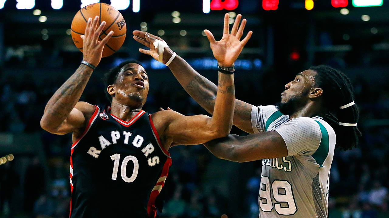 Jae-Crowder-of-the-Celtics-knocks-the-ball-out-of-DeMar-DeRozan's-hands.-(Michael-Dwyer/AP)