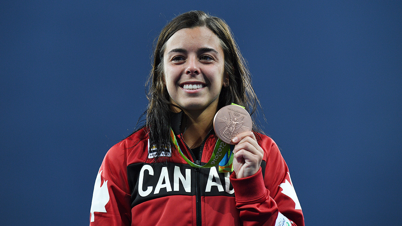 Canada's Meaghan Benfeito celebrates bronze in the women's 10m platform final . (Sean Kilpatrick/CP)