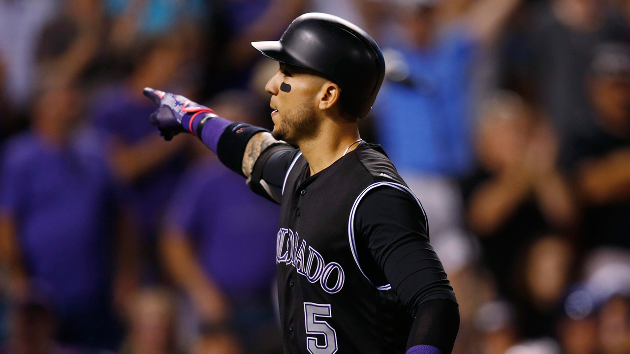 Gonzalez hits 2 HRs before injury; Rockies beat Dodgers