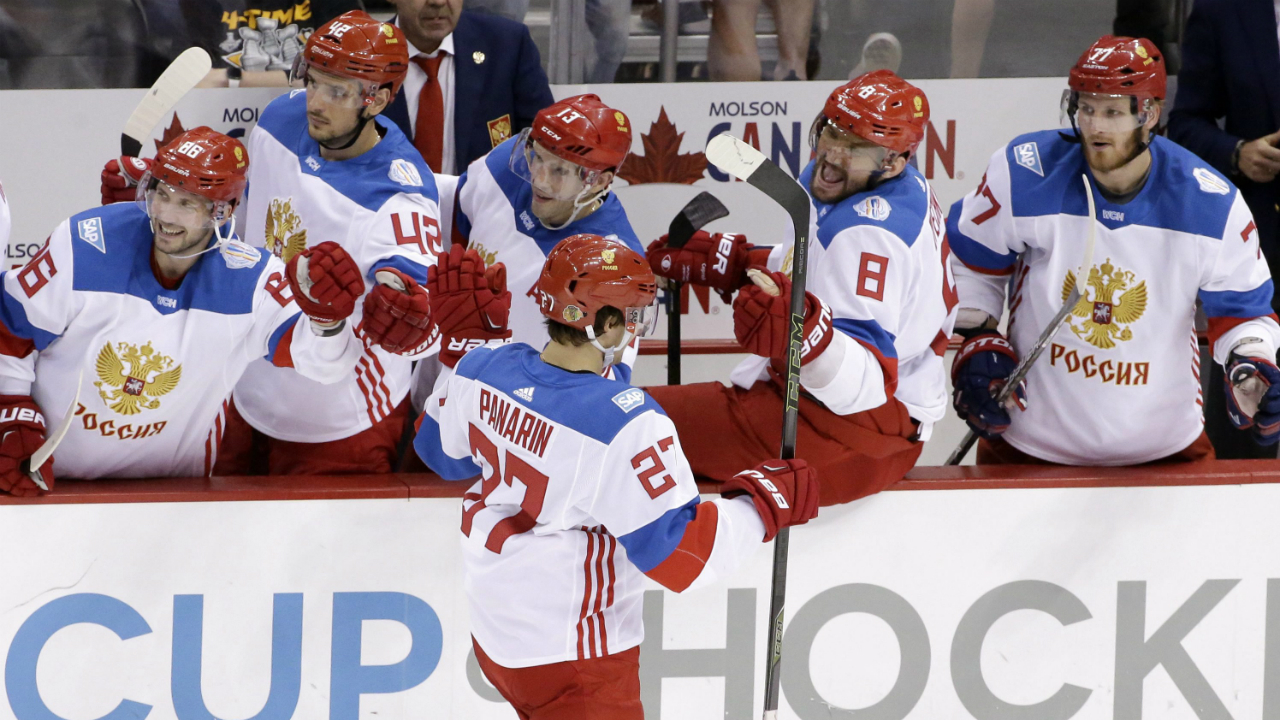 Team-Russia's-Artemi-Panarin-(27)-celebrates-his-goal-as-he-returns-to-the-bench-during-the-third-period-of-a-World-Cup-of-Hockey-exhibition-game-against-Team-Canada-in-Pittsburgh-on-Wednesday,-Sept.-14,-2016.-Canada-won-in-overtime,-3-2.-(AP-Photo/Gene-J.-Puskar)