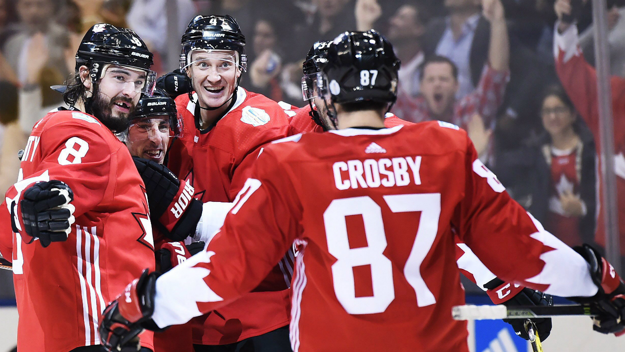 Team-Canada's-Brad-Marchand-(63),-centre-left,-celebrates-his-goal-against-Team-Russia-with-teammates-Drew-Doughty-(8),-Team-Canada's-D-Jay-Bouwmeester-(4)-and-Sidney-Crosby-(87)-during-third-period-World-Cup-of-Hockey-semifinal-action-in-Toronto-on-Saturday,-September-24,-2016.-THE-CANADIAN-PRESS/Nathan-Denette