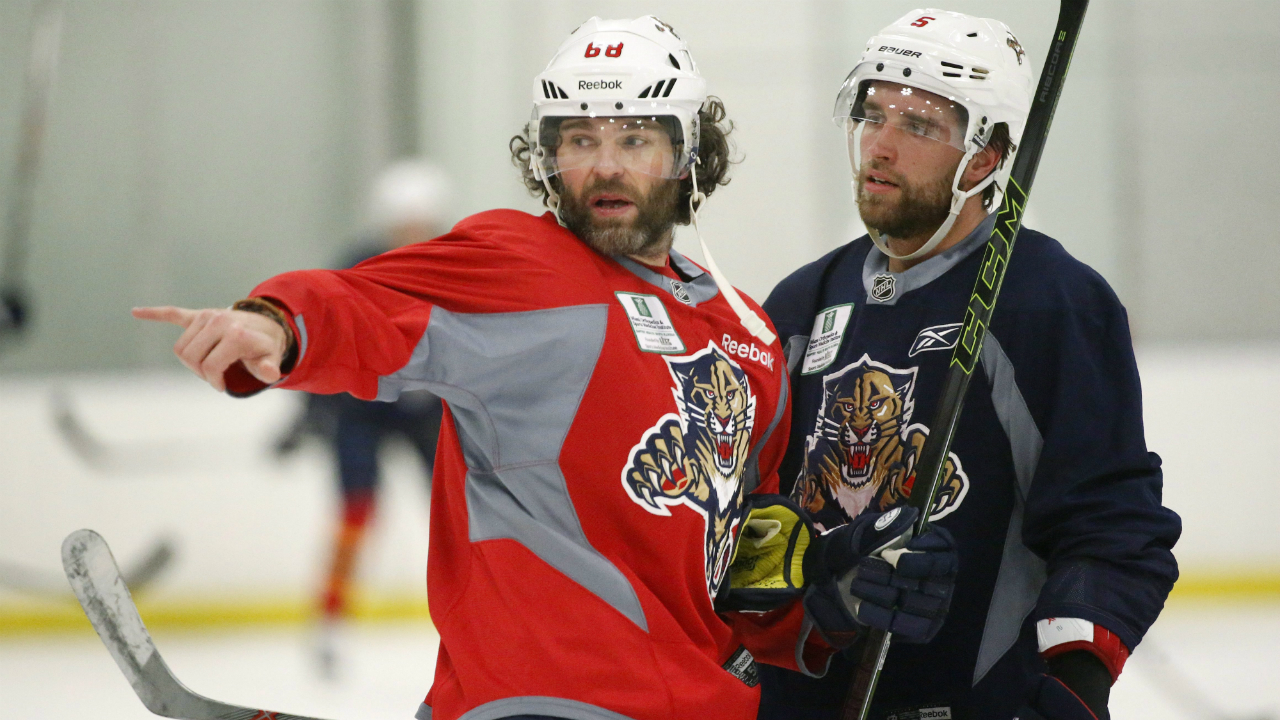 Florida-Panthers-right-wing-Jaromir-Jagr,-left,-talks-with-defenceman-Aaron-Ekblad-during-a-practice-session,-Tuesday,-April-12,-2016,-at-the-Panthers'-practice-facility-in-Coral-Springs,-Fla.-The-Panthers-take-on-the-New-York-Islanders-in-Game-1-in-the-first-round-of-the-playoffs-on-Thursday-at-Florida.-(AP-Photo/Wilfredo-Lee)