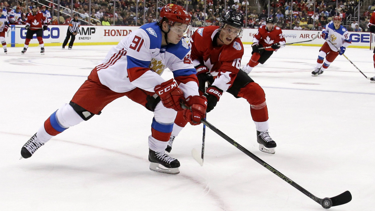 Team-Russia's-Vladimir-Tarasenko-(91)-battles-for-the-puck-with-Team-Canada's-Jonathan-Toews-(16)-during-the-second-period-of-a-World-Cup-of-Hockey-exhibition-game-in-Pittsburgh-on-Wednesday,-Sept.-14,-2016.-(AP-Photo/Gene-J.-Puskar)