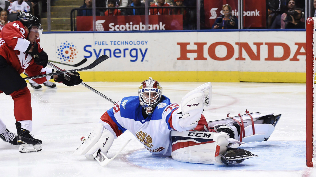 Team-Russia's-goalie-Sergei-Bobrovsky-(72)-makes-a-save-on-Team-Canada's-Brad-Marchand-(63)-during-third-period-World-Cup-of-Hockey-semifinal-action-in-Toronto-on-Saturday,-September-24,-2016.-THE-CANADIAN-PRESS/Nathan-Denette