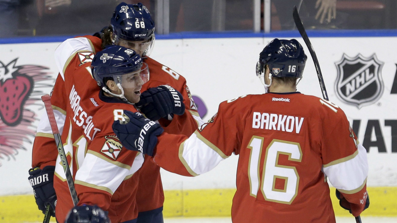 Florida-Panthers-center-Jonathan-Marchessault-(81)-is-congratulated-by-Jaromir-Jagr-(68)-and-Aleksander-Barkov-(16)-after-scoring-against-the-New-Jersey-Devils-during-the-first-period-of-an-NHL-hockey-game,-Thursday,-Oct.-13,-2016,-in-Sunrise,-Fla.-(AP-Photo/Alan-Diaz)