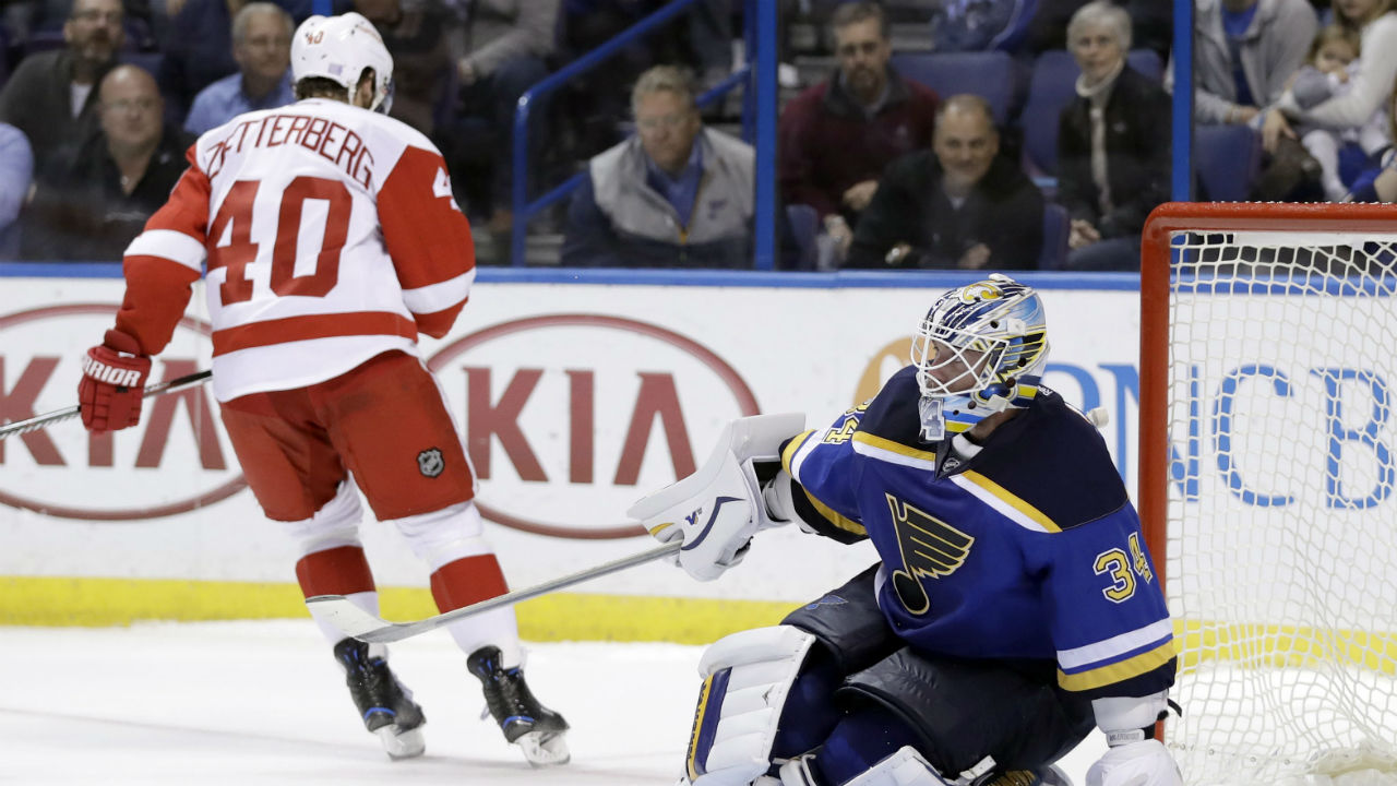 St.-Louis-Blues-goalie-Jake-Allen,-right,-is-slow-to-get-up-after-giving-up-the-winning-goal-to-Detroit-Red-Wings'-Henrik-Zetterberg,-of-Sweden,-during-a-shootout-of-an-NHL-hockey-game-Thursday,-Oct.-27,-2016,-in-St.-Louis.-(AP-Photo/Jeff-Roberson)