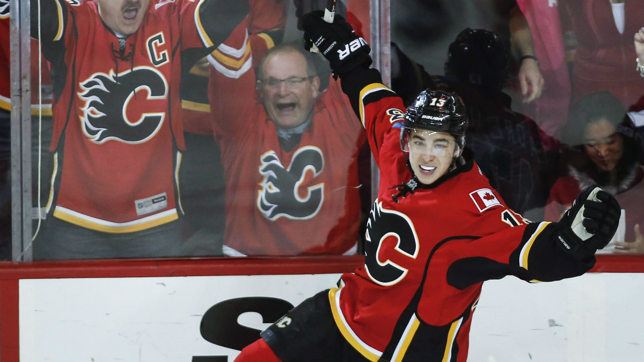 Calgary-Flames-Johnny-Gaudreau-celebrates-his-goal-during-second-period-NHL-first-round-game-six-playoff-hockey-action-against-the-Vancouver-Canucks-in-Calgary,-Saturday,-April-25,-2015.-Jeff-McIntosh-(CP)