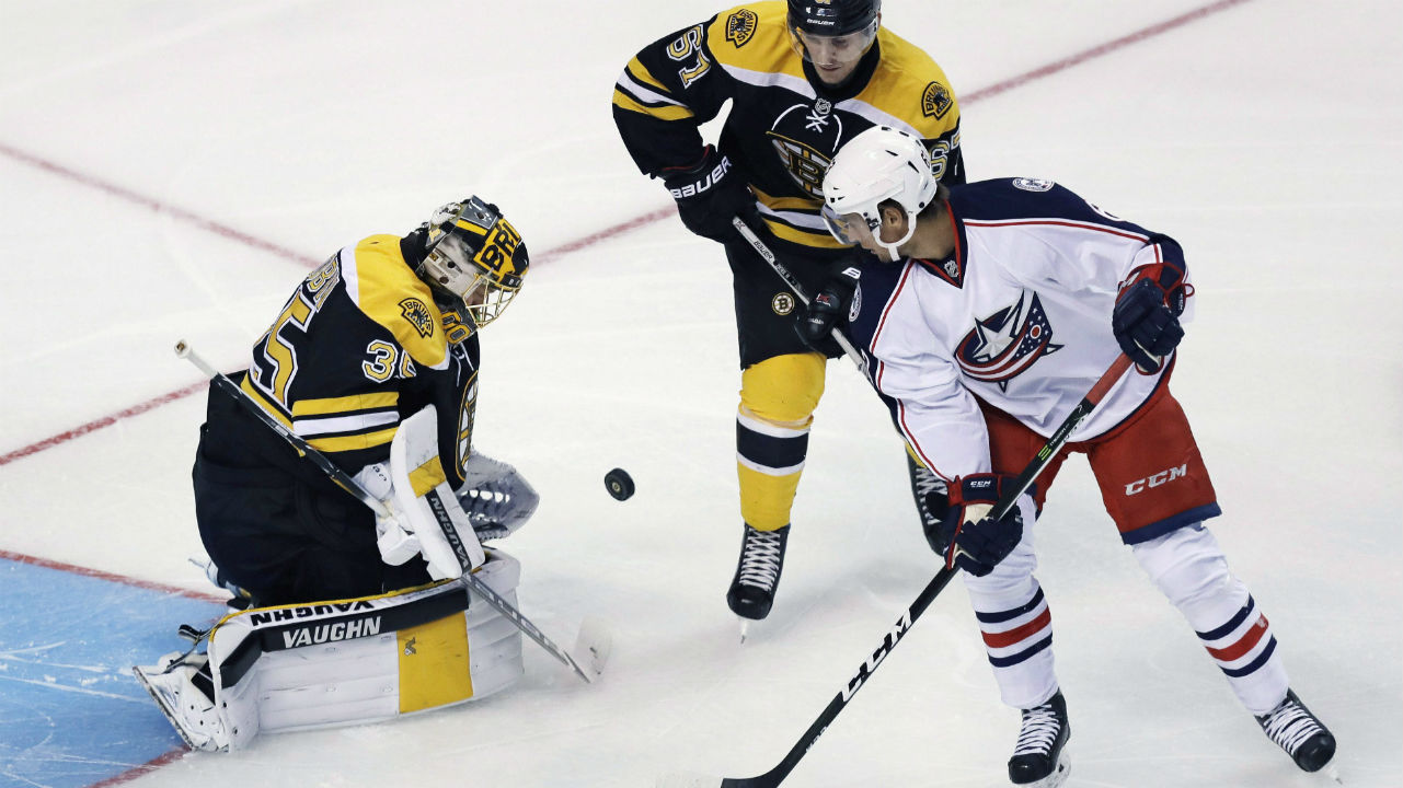 Boston-Bruins-goalie-Anton-Khudobin,-left,-makes-a-save-on-a-shot-by-Columbus-Blue-Jackets-right-wing-Daniel-Zaar,-right,-during-the-first-period-of-a-preseason-NHL-hockey-game-in-Boston,-Monday,-Sept.-26,-2016.-At-center-is-Bruins-center-Austin-Czarnik.-(Charles-Krupa/AP)