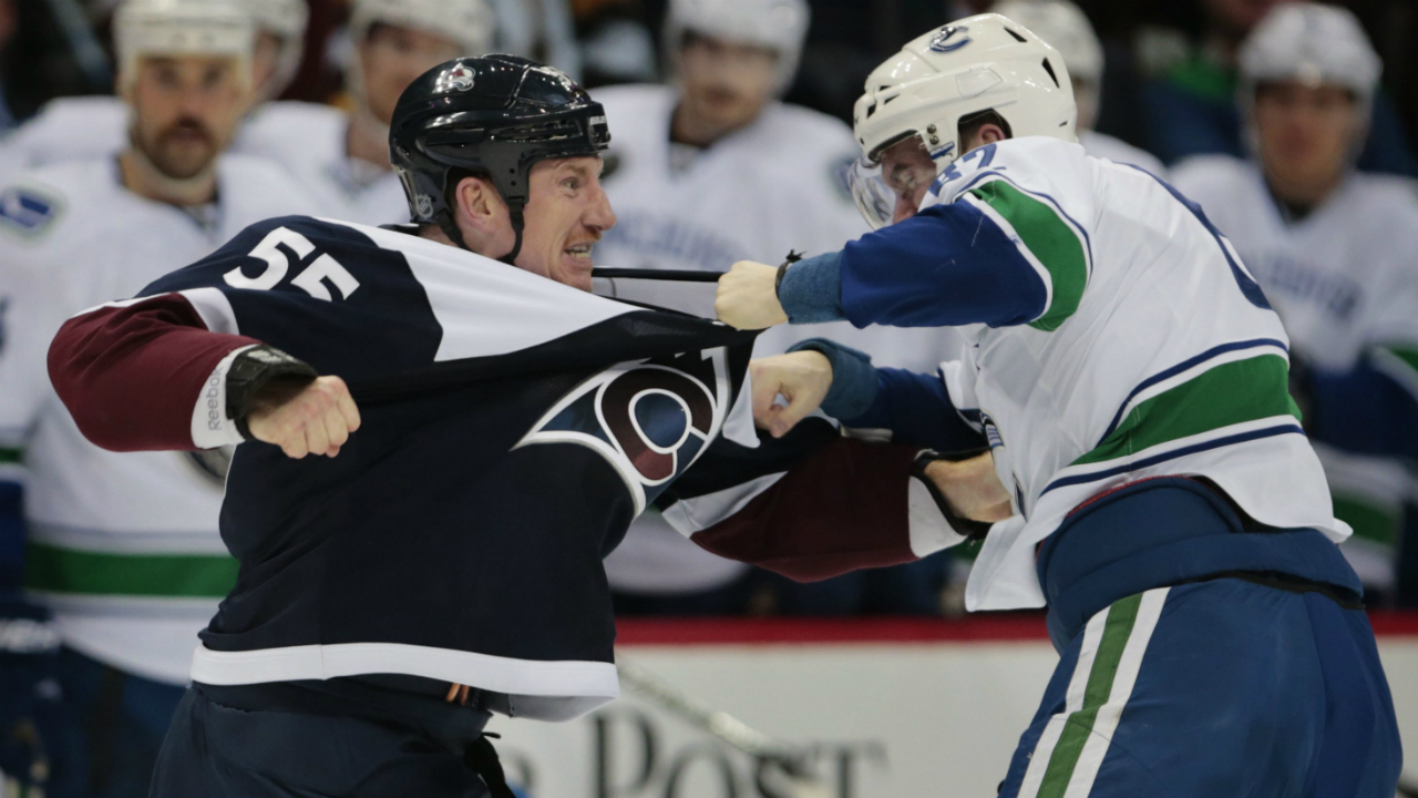 Colorado-Avalanche-left-wing-Cody-McLeod-(55)-fights-Vancouver-Canucks-center-Joseph-Labate-(62)-during-the-second-period-of-an-NHL-hockey-game,-Saturday,-Nov.-26,-2016-in-Denver.(AP-Photo/Joe-Mahoney)