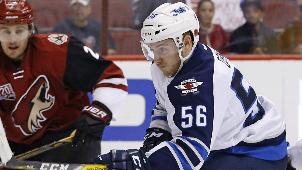 Winnipeg-Jets-centre-Marko-Dano-(56)-tries-to-get-control-of-the-puck-in-front-of-Arizona-Coyotes-defenceman-Luke-Schenn-(2)-during-the-first-period-of-an-NHL-hockey-game-Thursday,-Nov.-10,-2016,-in-Glendale,-Ariz.-(Ross-D.-Franklin/AP)