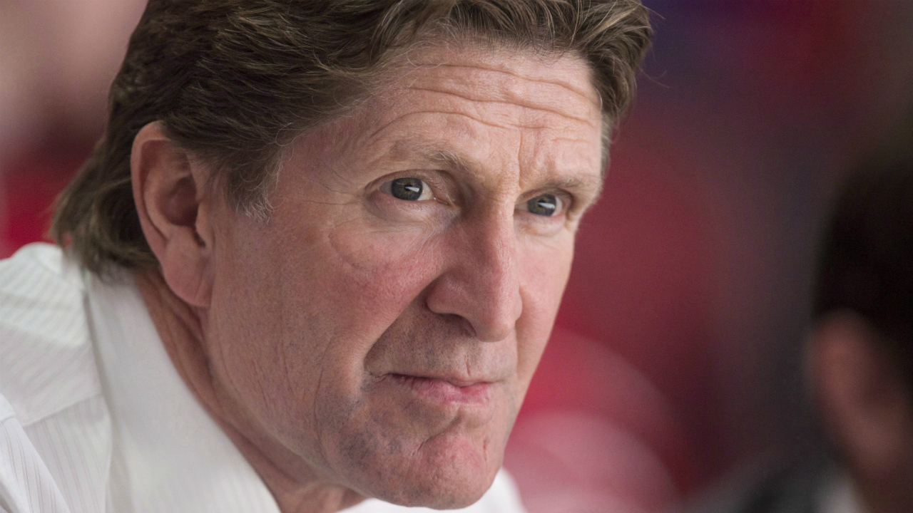 Toronto-Maple-Leafs-head-coach-Mike-Babcock-sits-with-the-crowd-as-he-watches-his-team-warm-up-prior-to-facing-the-Montreal-Canadiens-in-NHL-pre-season-hockey-action-Thursday,-October-6,-2016-in-Montreal.-(Paul-Chiasson/CP)