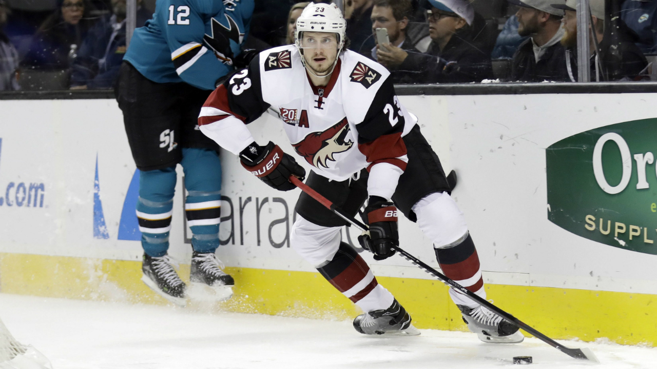 Arizona-Coyotes'-Oliver-Ekman-Larsson-(23)-controls-the-puck-in-front-of-San-Jose-Sharks'-Patrick-Marleau-(12)-during-the-first-period-of-an-NHL-hockey-game-Tuesday,-Nov.-29,-2016,-in-San-Jose,-Calif.-(Marcio-Jose-Sanchez/AP)